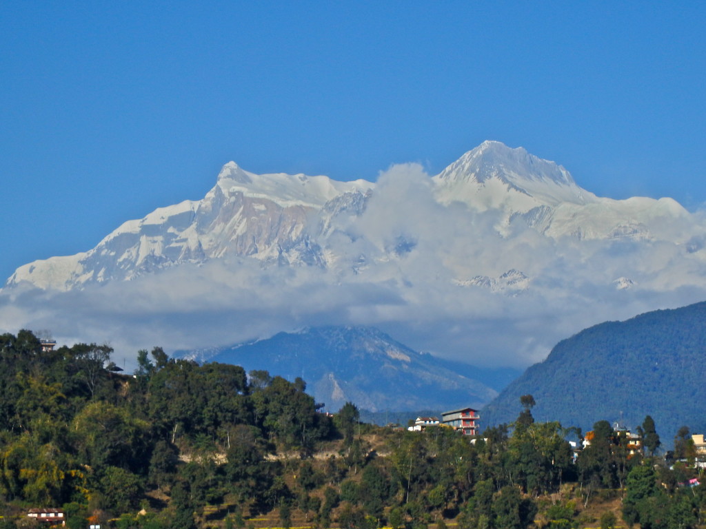 Annapurna Range from Pokhara, Nepal, from the air where is the best place to see the himalayas best places to hike in nepal where to go in nepal for solo females