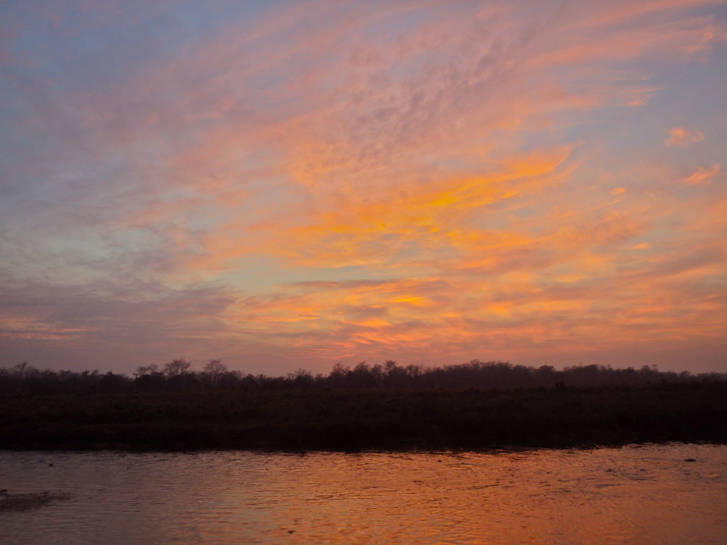 Sunset over Chitwan jungle nepal where to visit in nepal what to do in chitwan nepal best places to travel in nepal